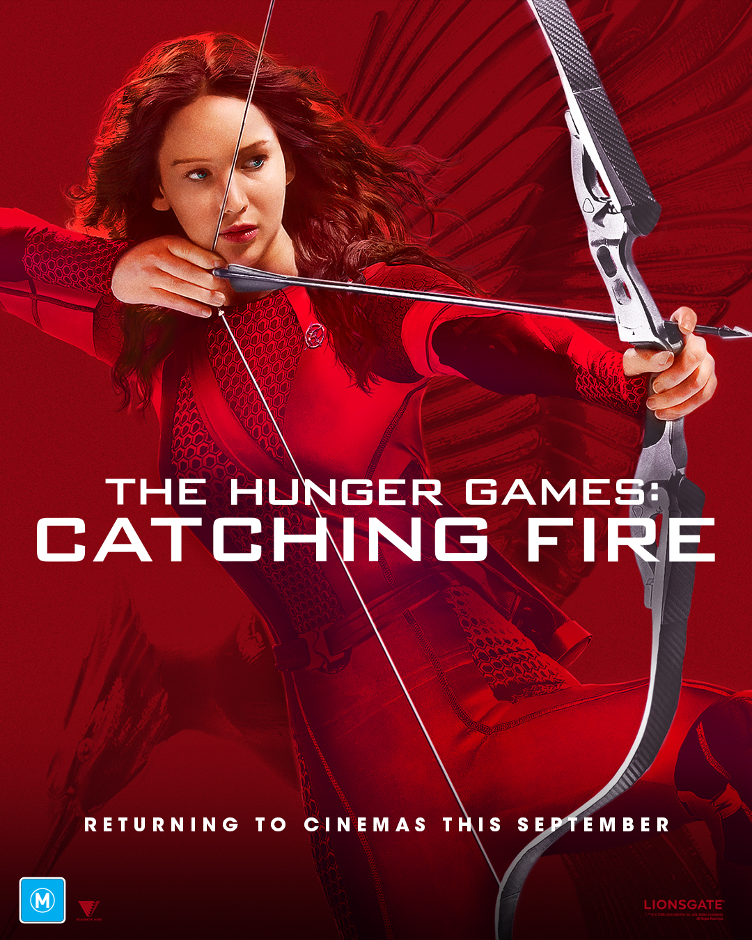 A movie poster of The Hunger Games: Catching Fire (Re-release).